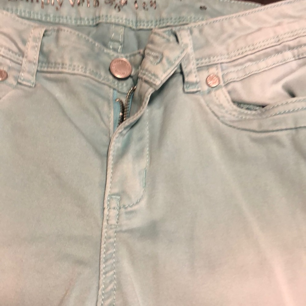 Light green crop pants.